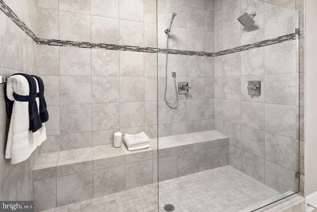 bathroom featuring a shower stall