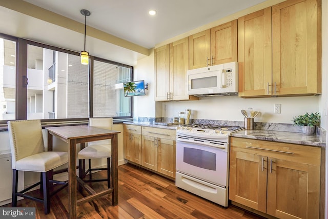 kitchen with white appliances, dark wood-type flooring, and light brown cabinets