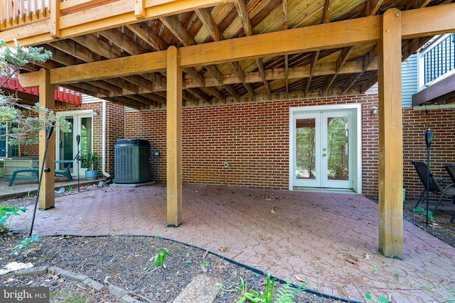 view of patio / terrace with french doors and central AC