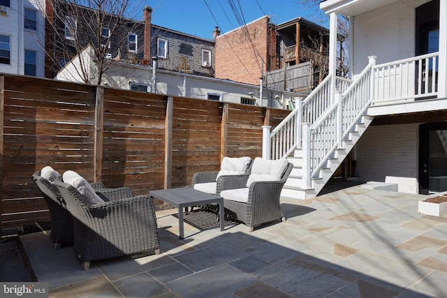 view of patio with stairway