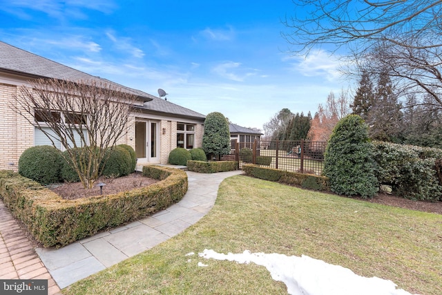 view of yard featuring fence