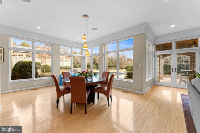 sunroom with french doors and visible vents