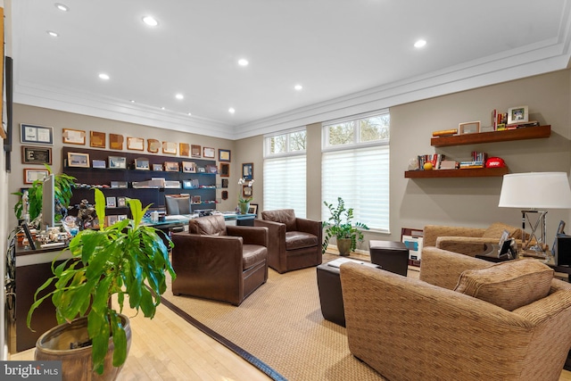 living area with recessed lighting, crown molding, and light wood finished floors