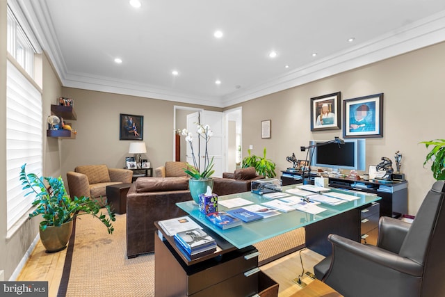 office with light wood-style floors, ornamental molding, and recessed lighting