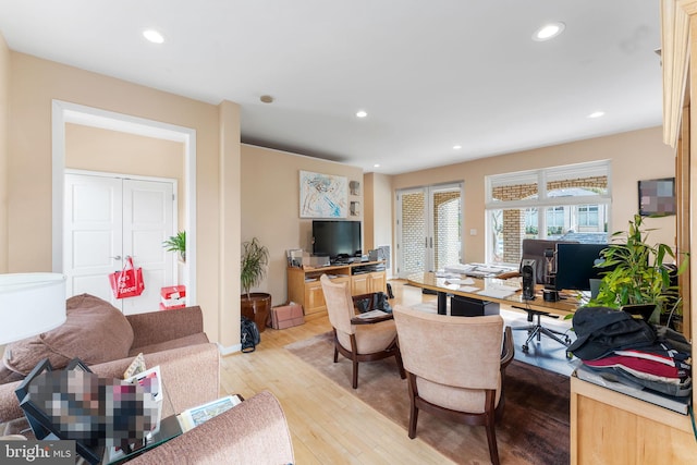 interior space featuring light wood-style floors and recessed lighting