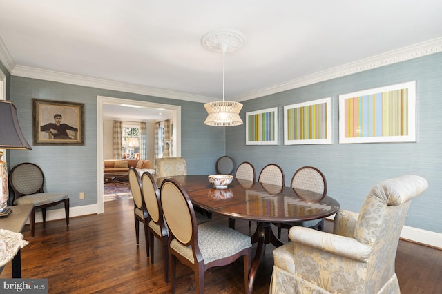 dining area with crown molding, wallpapered walls, dark wood-type flooring, and baseboards