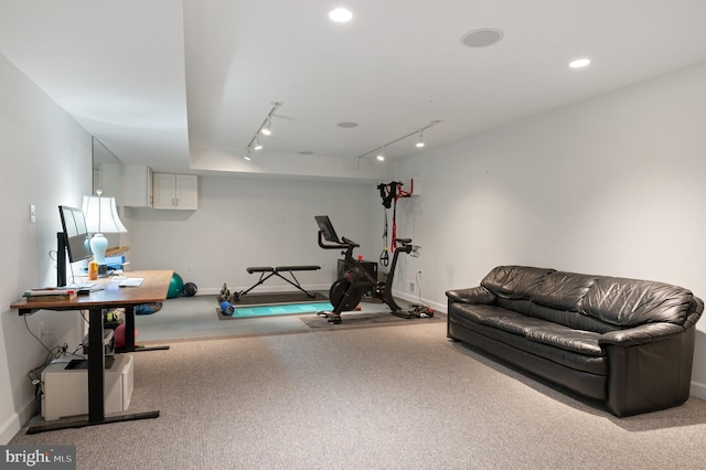 exercise area with recessed lighting and baseboards