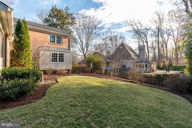 view of yard featuring fence