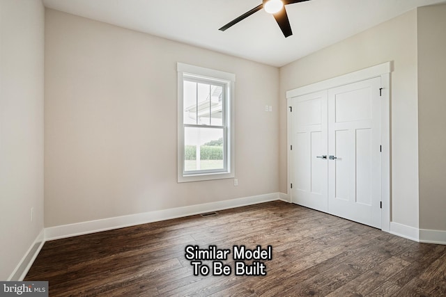 unfurnished bedroom featuring ceiling fan, visible vents, baseboards, a closet, and dark wood finished floors