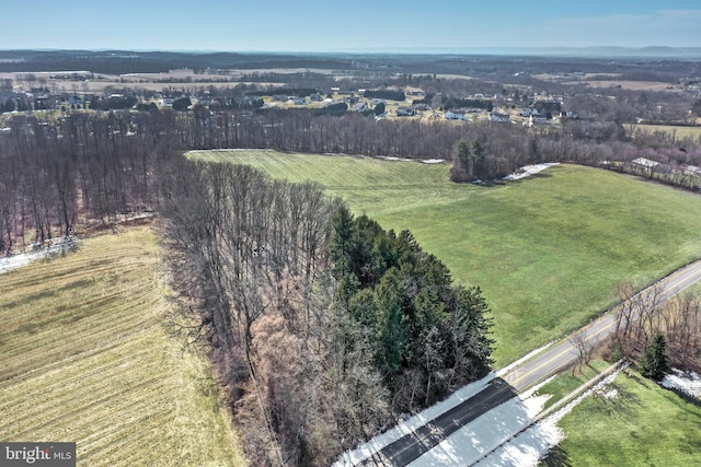 birds eye view of property featuring a rural view