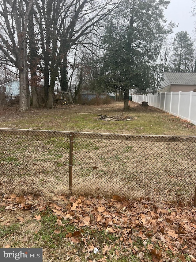 view of yard featuring fence