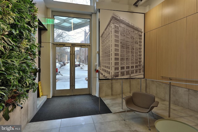 2200 Arch St Unit 503, Philadelphia, PA 19103 - entryway featuring tile patterned flooring, plenty of natural light, french doors, and a skylight