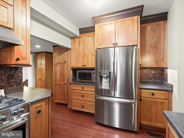 11116 Liberty Rd, Owings Mills, MD 21117 - kitchen with appliances with stainless steel finishes, dark countertops, tasteful backsplash, dark wood-style floors, and recessed lighting