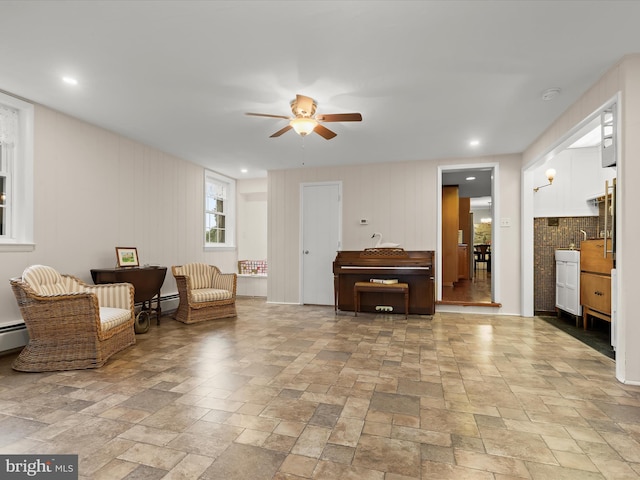11116 Liberty Rd, Owings Mills, MD 21117 - living area featuring ceiling fan, stone tile flooring, and recessed lighting