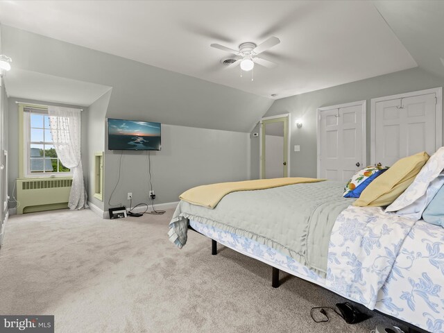 11116 Liberty Rd, Owings Mills, MD 21117 - bedroom featuring radiator, carpet floors, baseboards, vaulted ceiling, and a ceiling fan