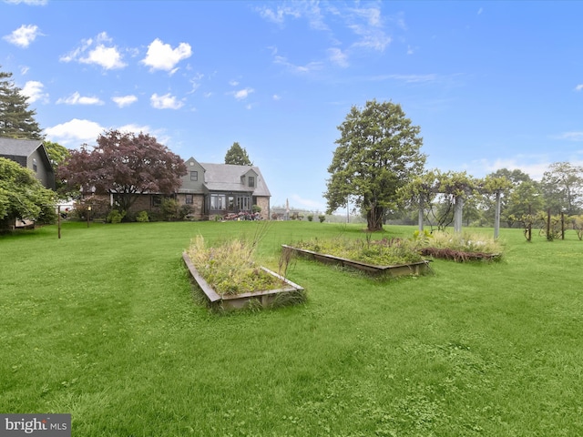 11116 Liberty Rd, Owings Mills, MD 21117 - view of grassy yard with a garden