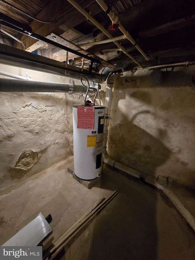 utility room featuring electric water heater