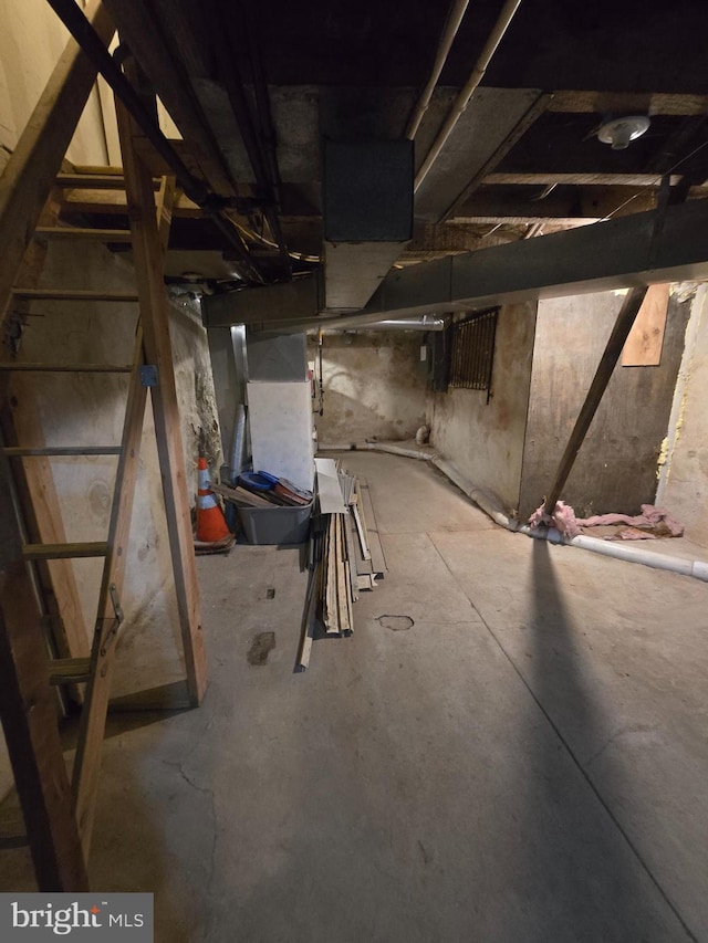 unfinished basement with heating unit