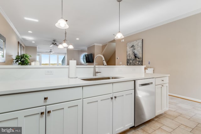 kitchen with crown molding, a sink, hanging light fixtures, and stainless steel dishwasher