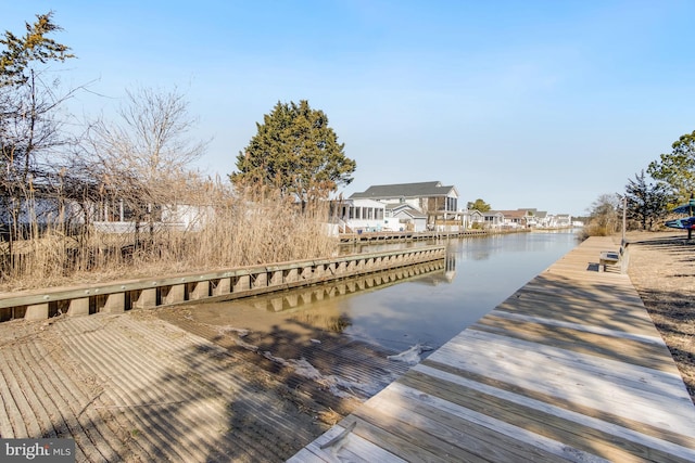 dock area with a water view