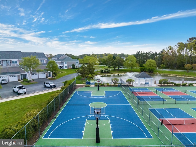 view of basketball court with a tennis court, a lawn, community basketball court, fence, and a residential view