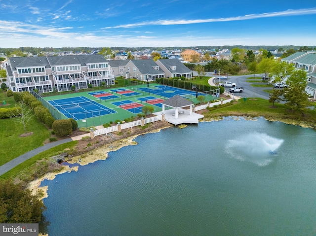 aerial view featuring a water view and a residential view