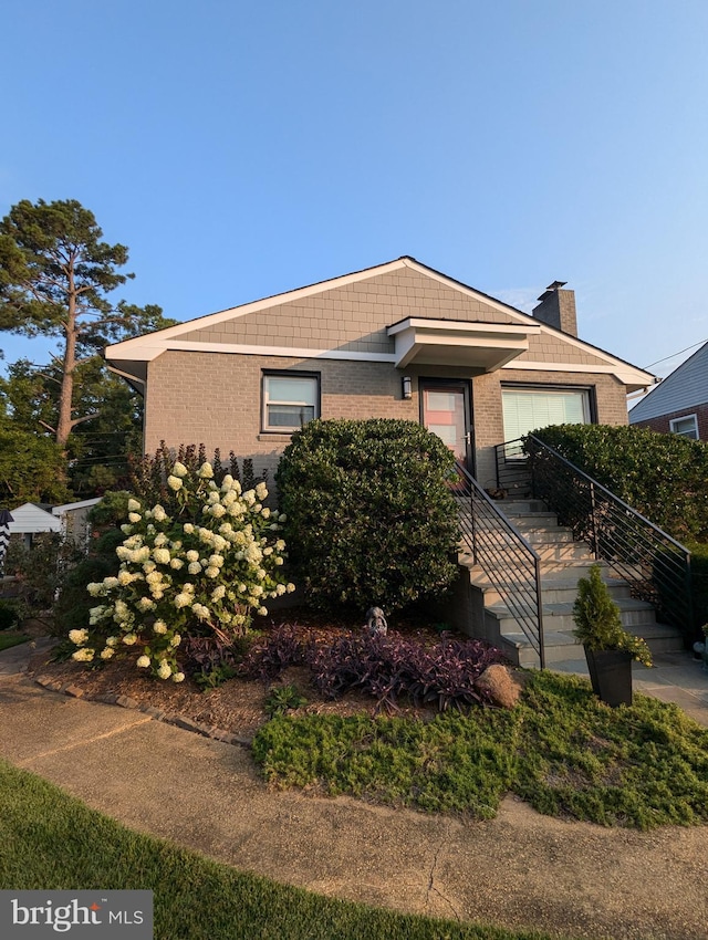 view of front facade featuring brick siding