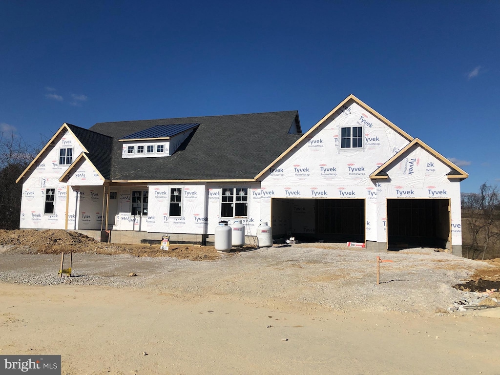 unfinished property featuring dirt driveway