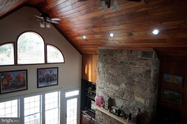 living room with vaulted ceiling, wooden ceiling, and ceiling fan