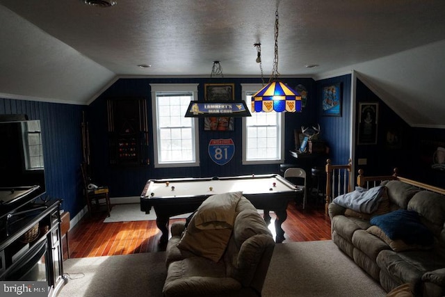 rec room featuring pool table, vaulted ceiling, a textured ceiling, wood finished floors, and baseboards