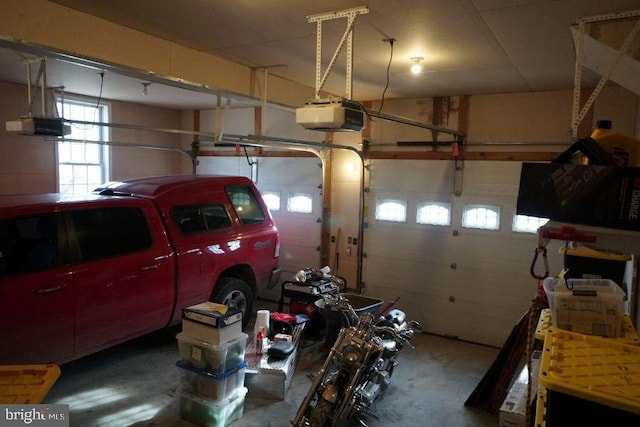 garage featuring a garage door opener