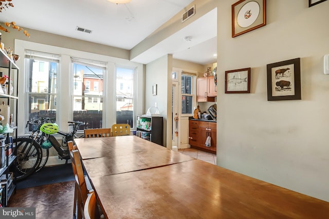 dining room with visible vents