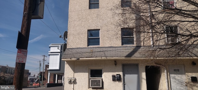 exterior space with stucco siding