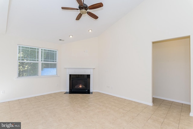 unfurnished living room featuring a fireplace with flush hearth, visible vents, baseboards, and a ceiling fan