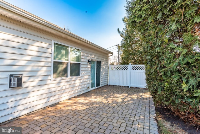 view of patio featuring fence