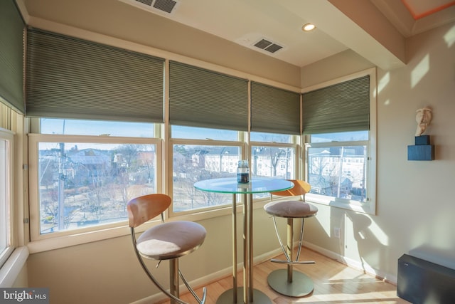 sunroom featuring visible vents