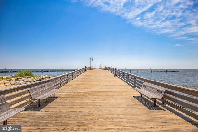 dock area featuring a water view