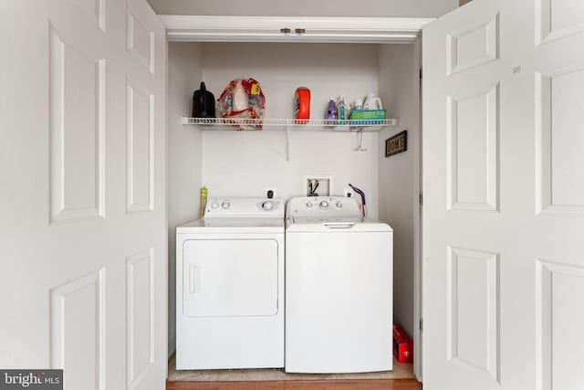 laundry room featuring laundry area and washer and clothes dryer