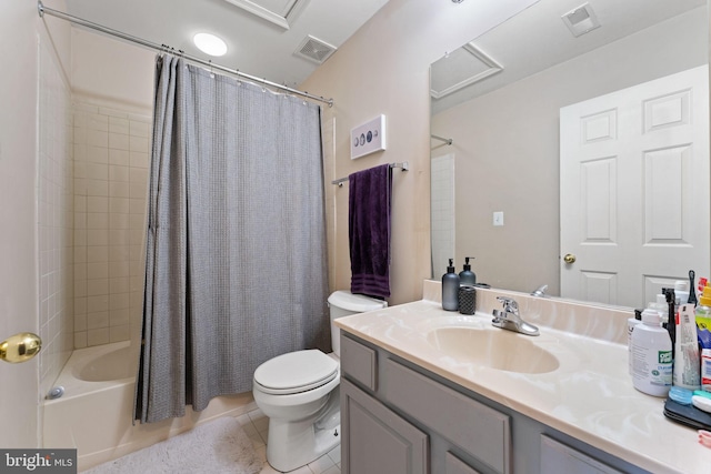 bathroom with vanity, tile patterned floors, toilet, and visible vents