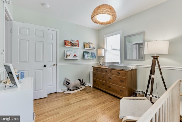 bedroom featuring wood finished floors