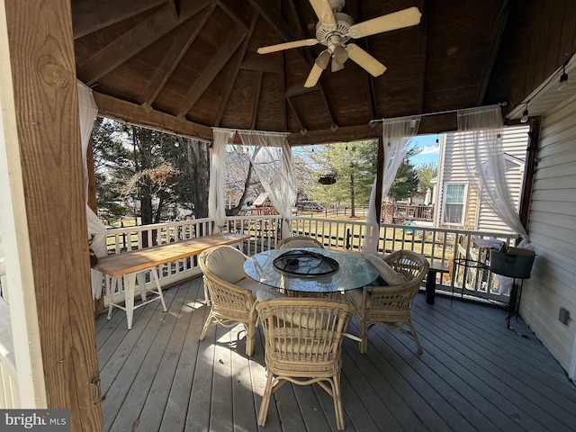 wooden deck with ceiling fan