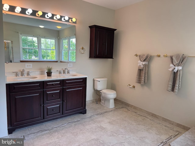 200 Stewards Ct, Bear, DE 19701 - full bath with baseboards, double vanity, and toilet