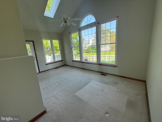 200 Stewards Ct, Bear, DE 19701 - unfurnished room featuring a skylight, plenty of natural light, carpet, baseboards, and high vaulted ceiling