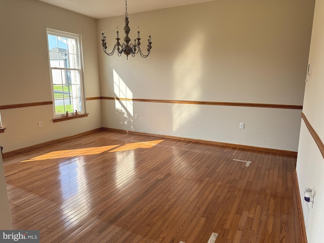 200 Stewards Ct, Bear, DE 19701 - empty room with hardwood / wood-style flooring, a chandelier, and baseboards