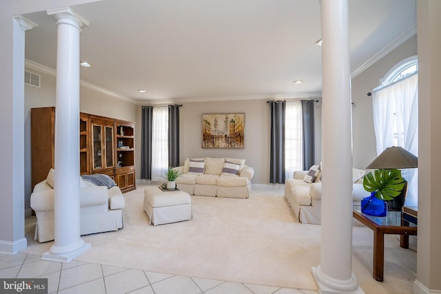 living area with light carpet, light tile patterned floors, decorative columns, visible vents, and crown molding