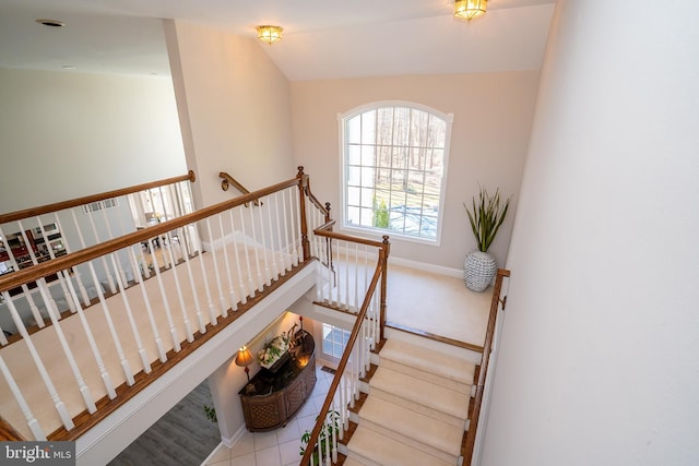 stairway featuring baseboards