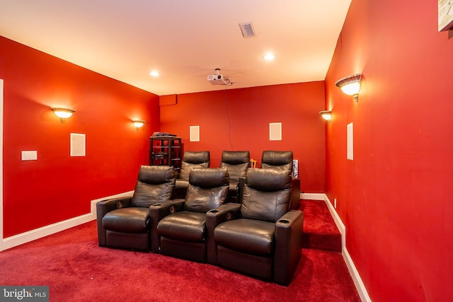 carpeted cinema room with baseboards, visible vents, and recessed lighting