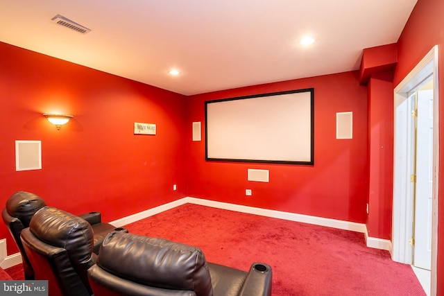 carpeted home theater room featuring recessed lighting, visible vents, and baseboards