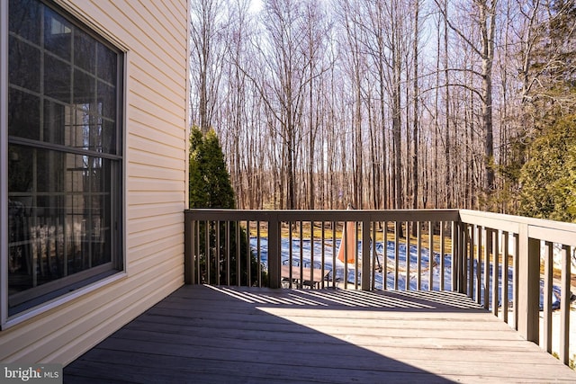 deck featuring a pool