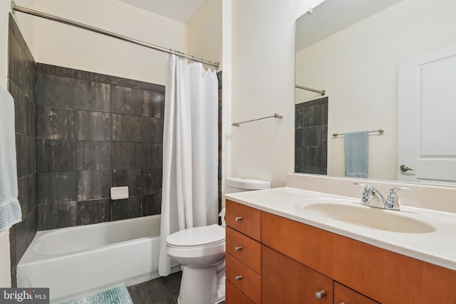 full bath with toilet, vanity, and shower / tub combo with curtain